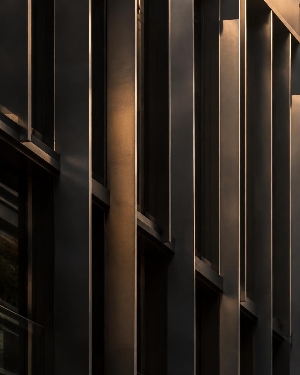 Light falling across a concrete office interior